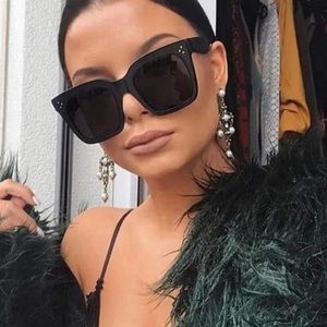 Black flat top oversized sunglasses